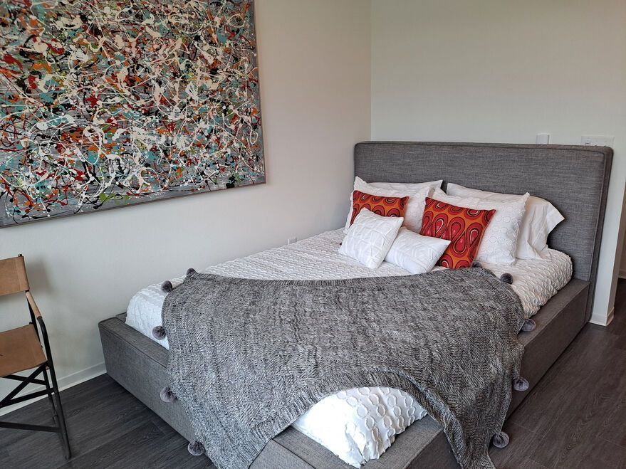 bed photo showing plenty of natural light