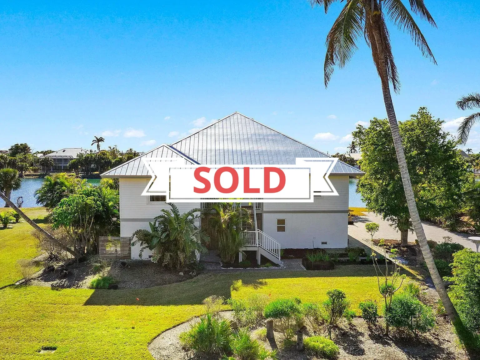 An aerial view of a house that has been sold.