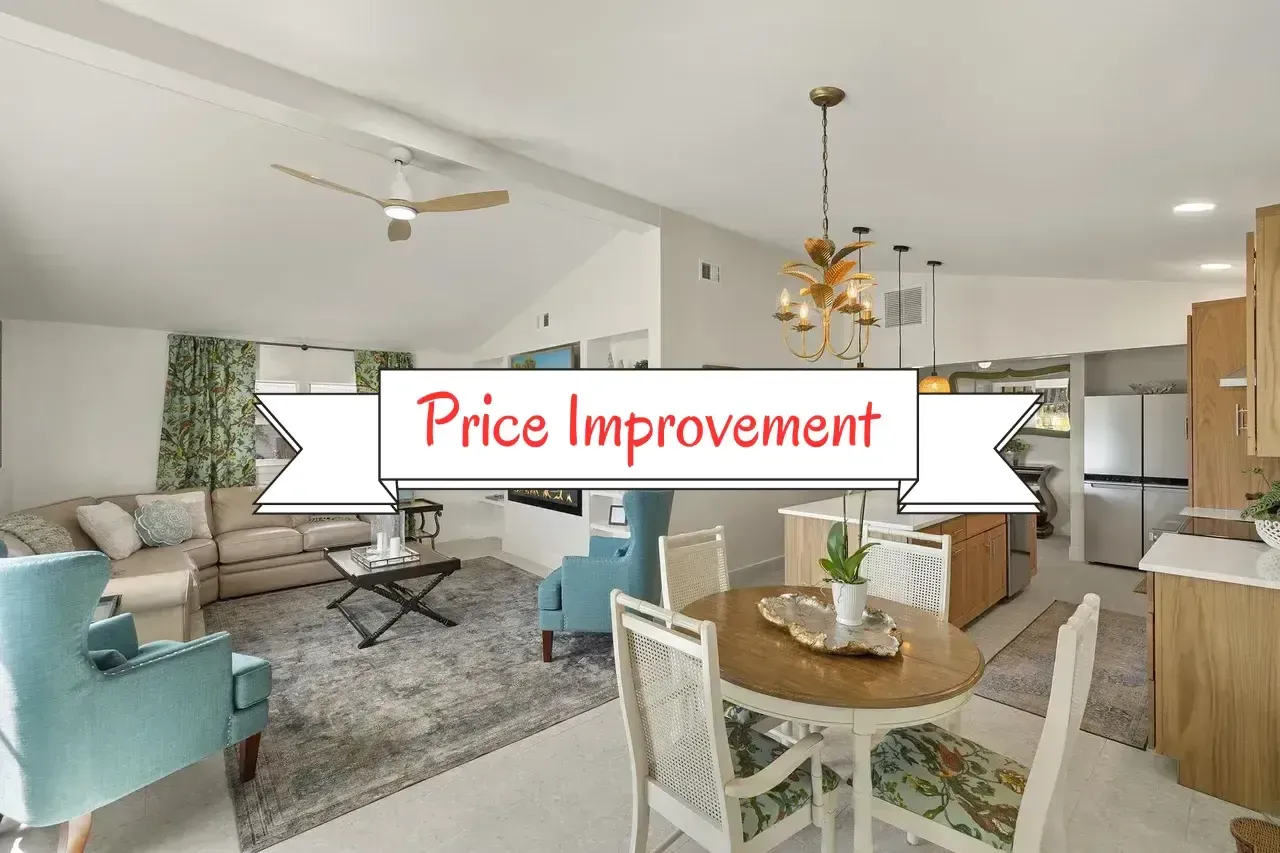 A picture of a living room and dining room with a price improvement banner.