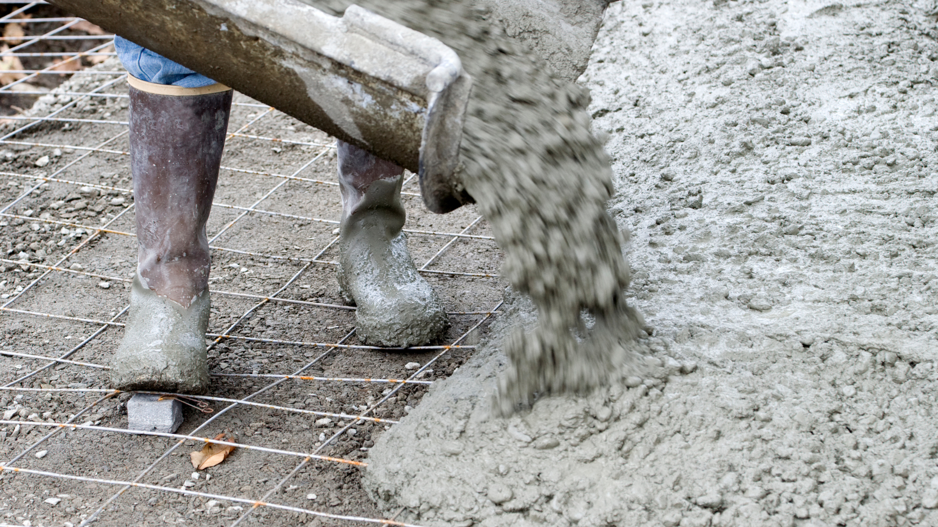 concrete worker finishing concrete