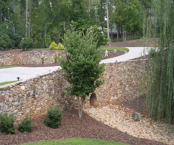 Tennesse River Rock in Run-Off Area — Landscaping Stone in Denton, NC