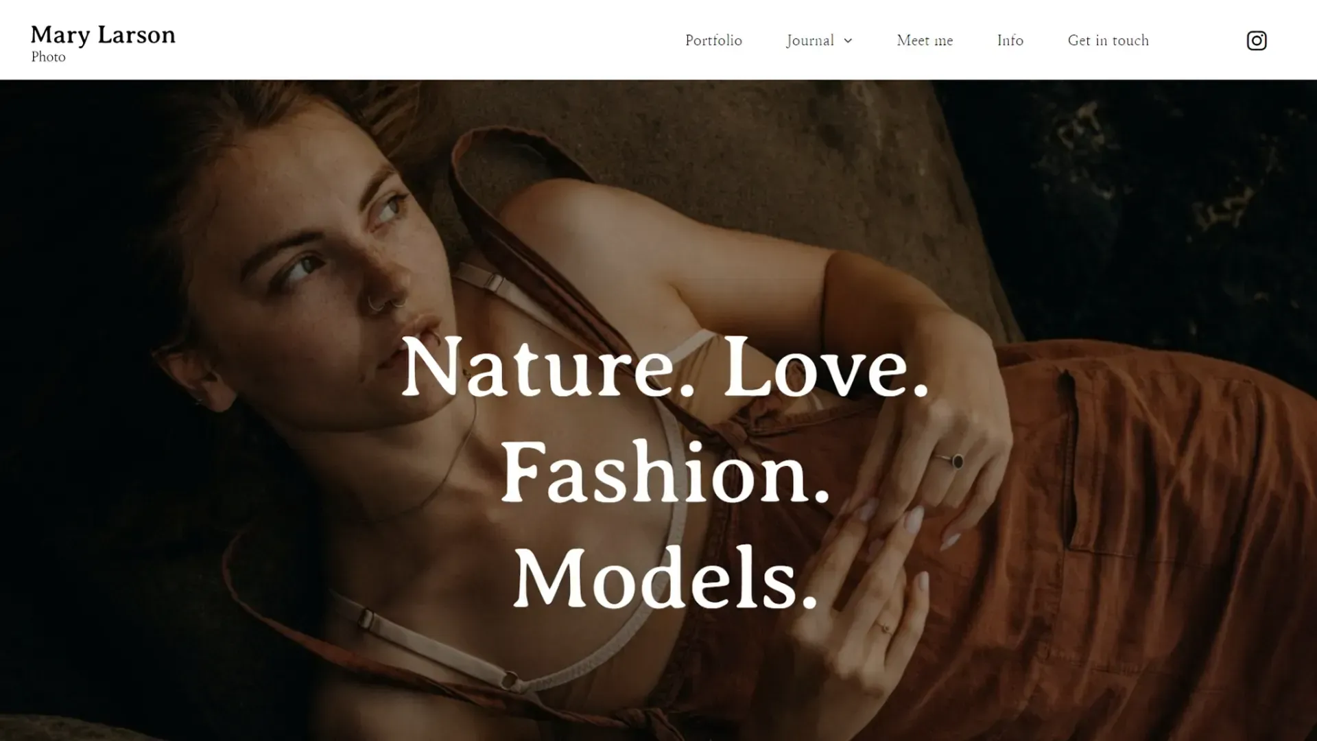 A woman in a dress is laying on a bed with the words `` nature love fashion models '' written above her.