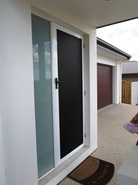 Glass door with fly screen