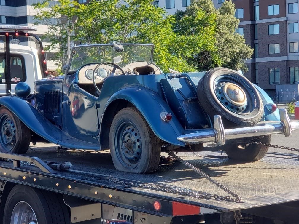 Truck Carrying a Car with Flat Tires — Concord, CA — ABC Towing