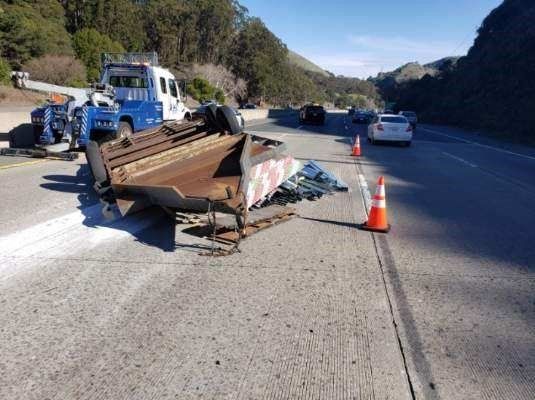 Tow Truck Lifting a Damaged Trailer — Concord, CA — ABC Towing