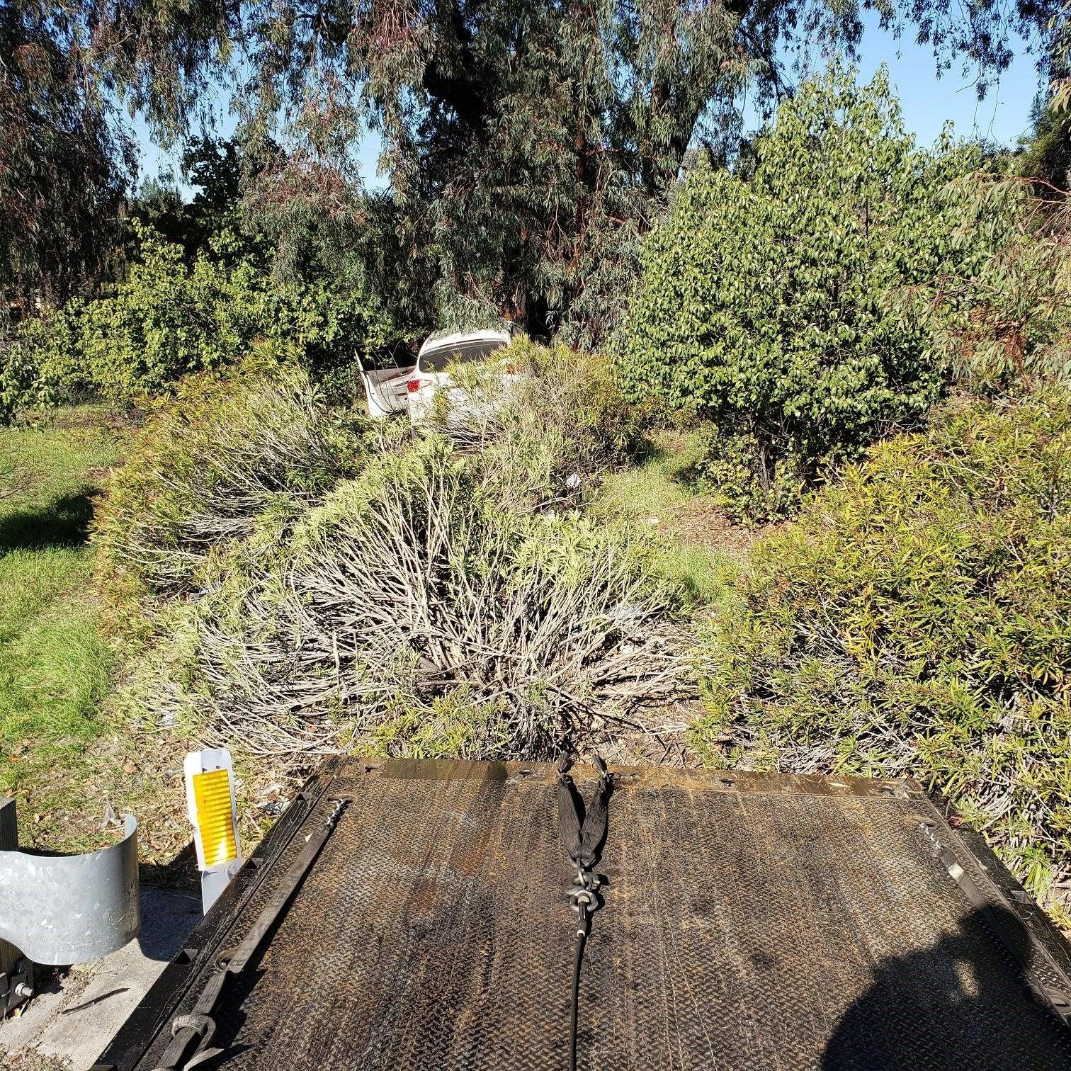 White Car Stuck Due to an Accident — Concord, CA — ABC Towing