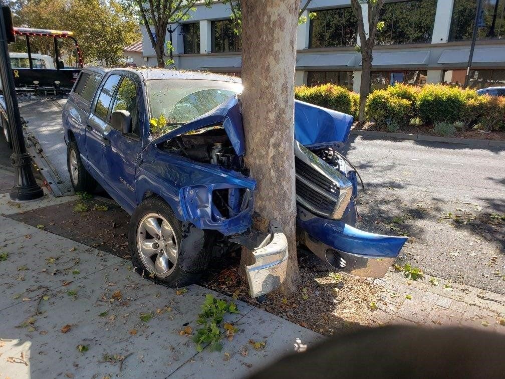 Damaged Blue Car — Concord, CA — ABC Towing