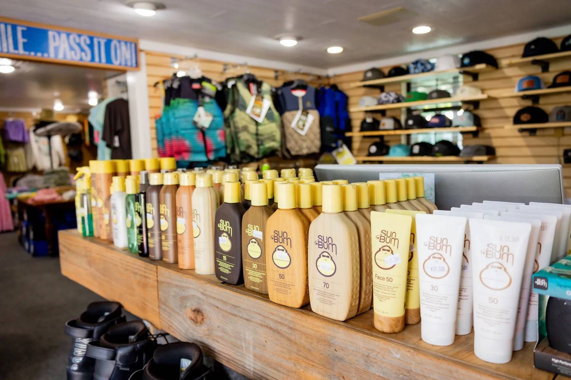 a row of sunscreen on a counter