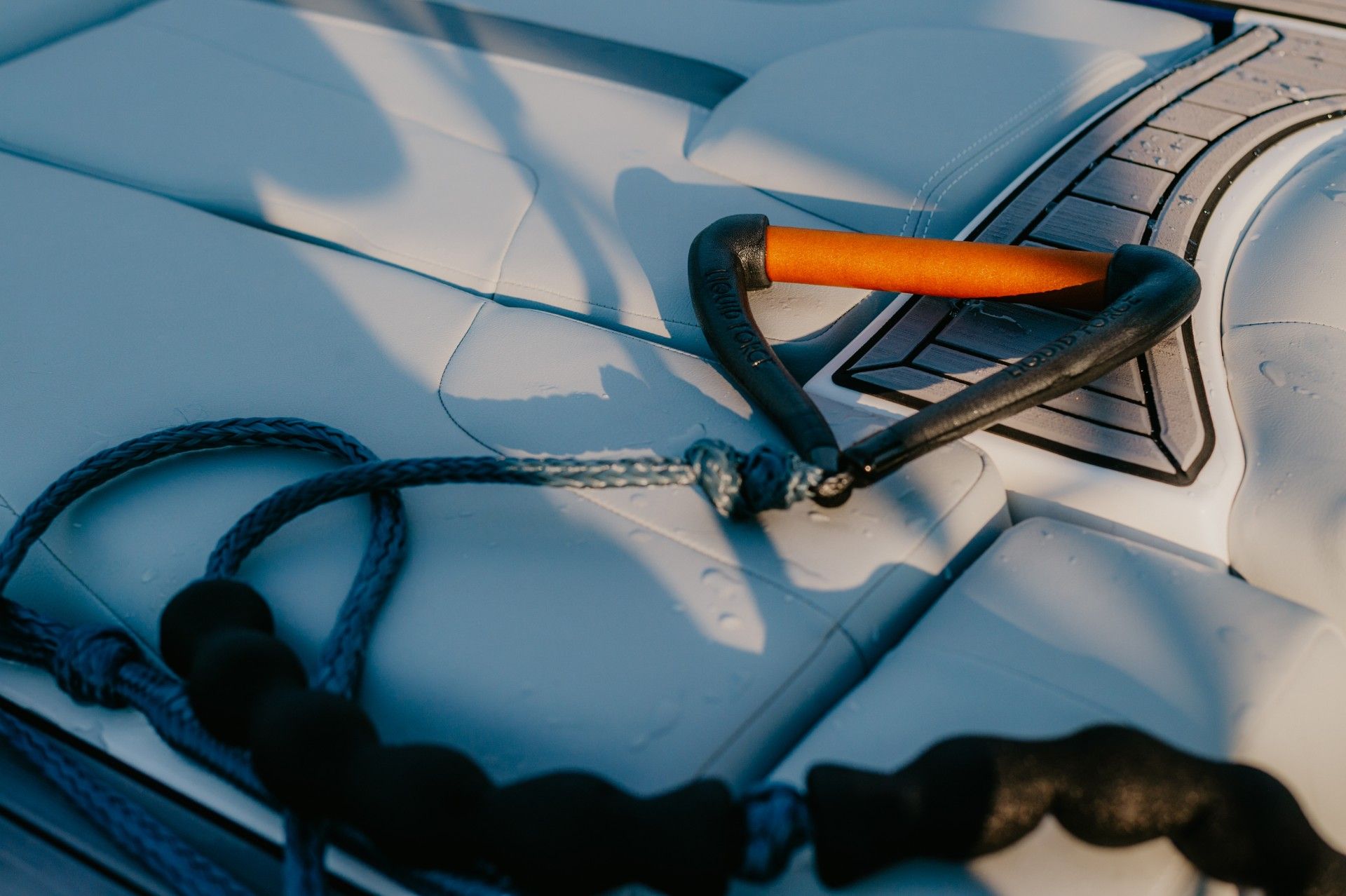 A rope is attached to a handle on a boat