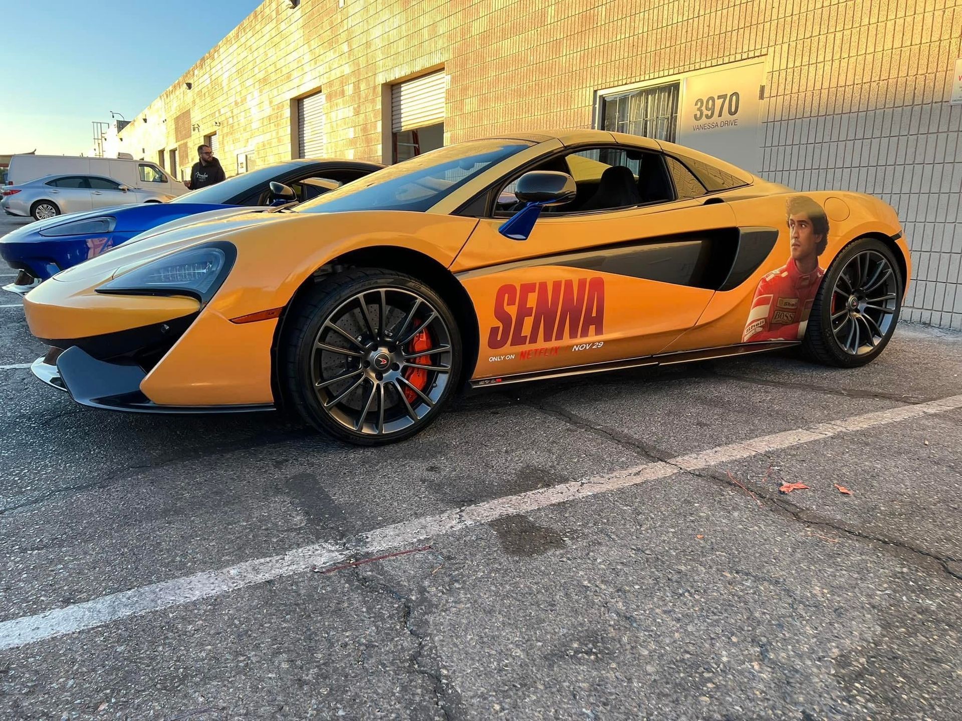Yellow McLaren sports car with 