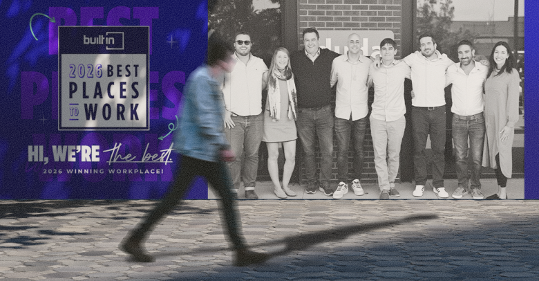 A man walks past a group of people and a 