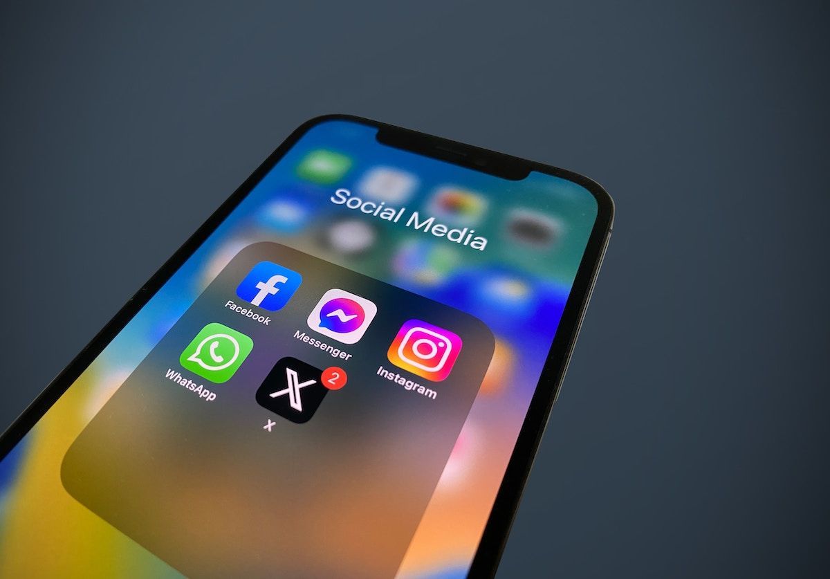 An image of an iPhone presenting a photo of several social media apps titled 
