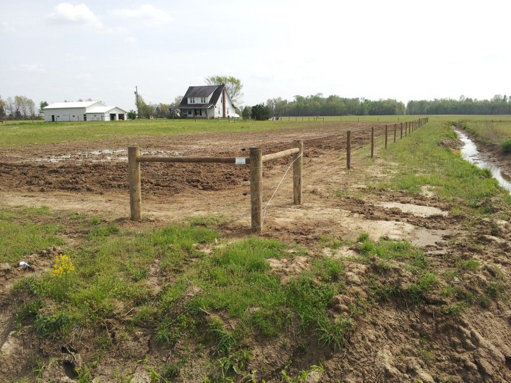 House Surrounded By A Fence In A Field - Columbus, IN - Indiana Agricultural Fencing