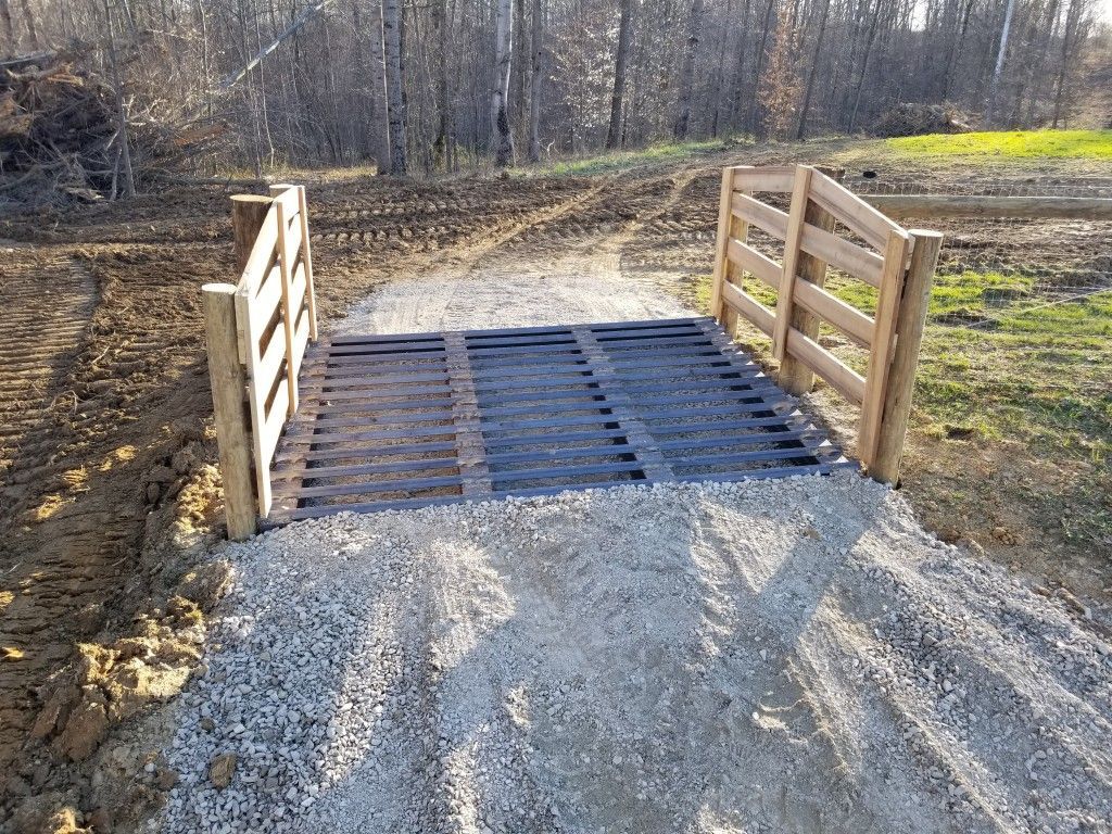 Wooden Bridge Being Constructed On A Dirt Road - Columbus, IN - Indiana Agricultural Fencing