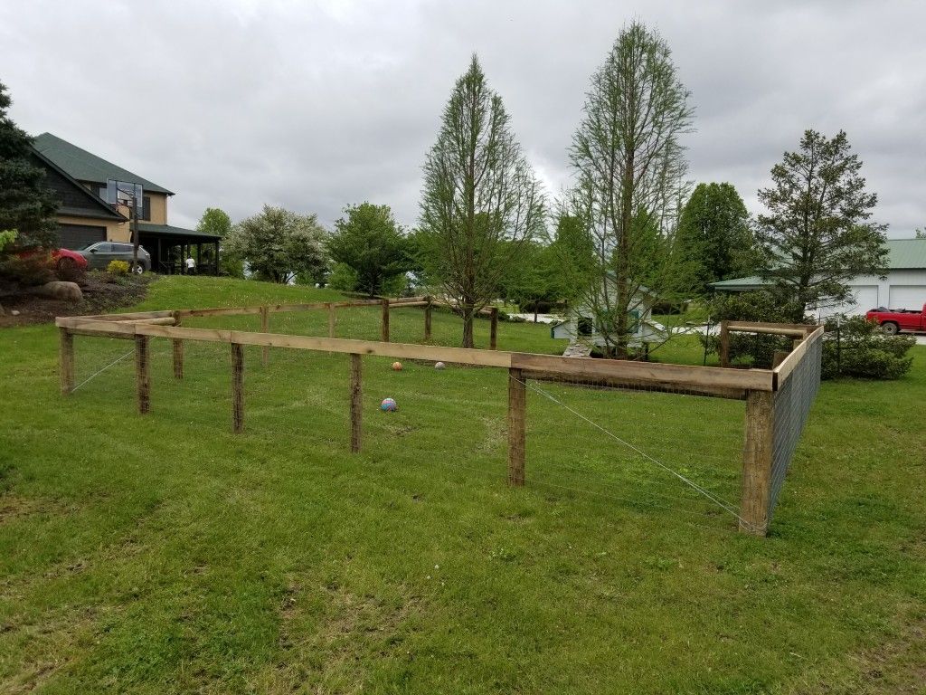 Dog Kennel With A Fence And A Fence Post - Columbus, IN - Indiana Agricultural Fencing