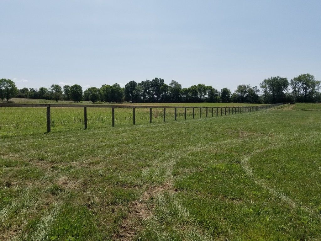 Fence Positioned In The Center Of A Field - Columbus, IN - Indiana Agricultural Fencing