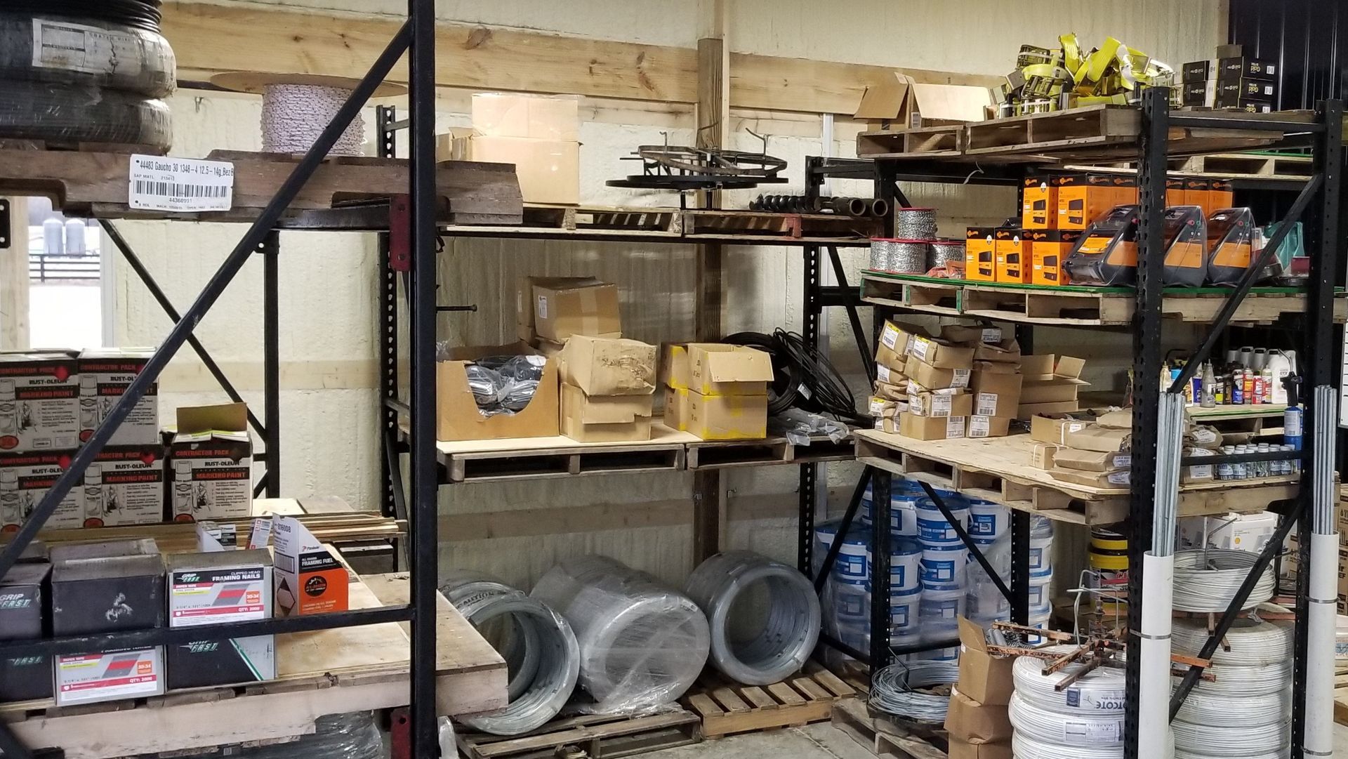 Warehouse Filled With Various Items Arranged On Shelves - Columbus, IN - Indiana Agricultural Fencing