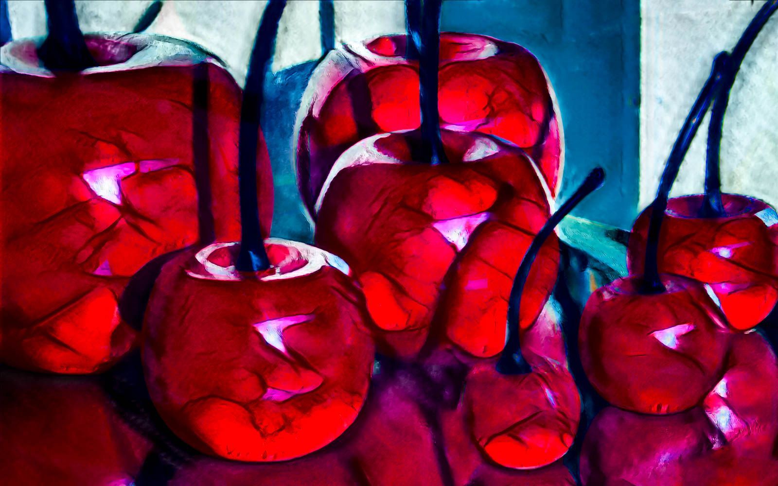 a photo illustration of red glass blown cherries with black stems