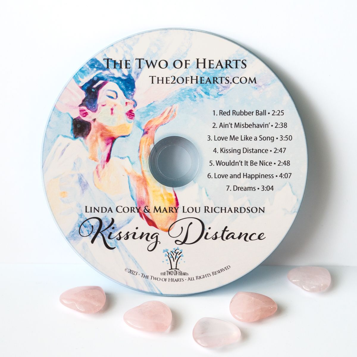 A cd titled kissing distance by linda cork and mary lou richardson