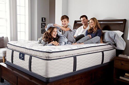 Happy Family On Bed — Thousand Oaks, CA — Conejo Valley Mattress