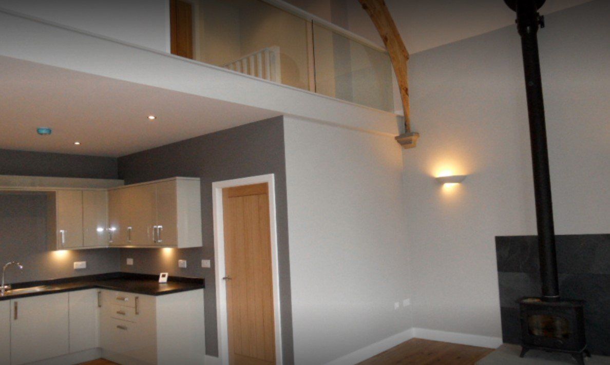 A picture of an open plan kitchen diner painted by Painters and Decorators Southampton