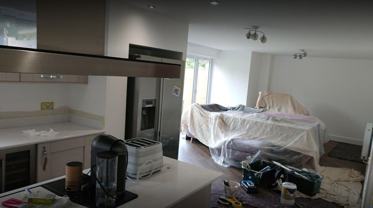 A picture of a white contemporary kitchen decorated by painters and decorators Southampton