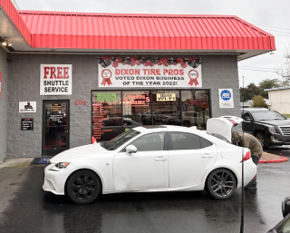 shop front with white car | Dixon Tire Pros & Auto Repair