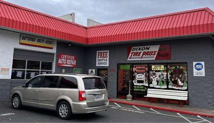 store front with gray van | Dixon Tire Pros & Auto Repair