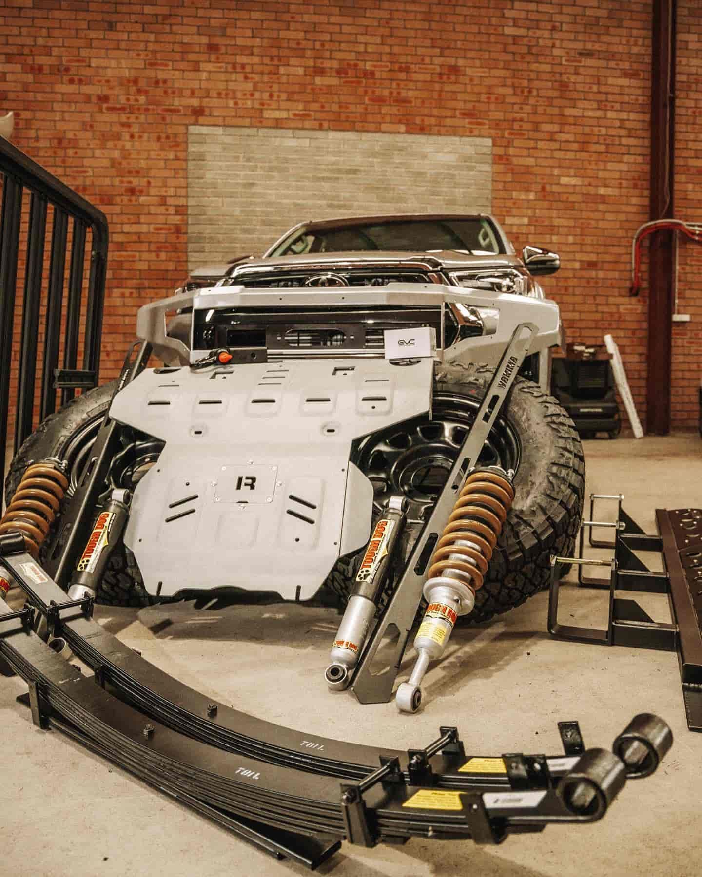 A Car is Sitting in a Garage Next to a Brick Wall — Nationwide Auto Service Centre in West Gosford, NSW