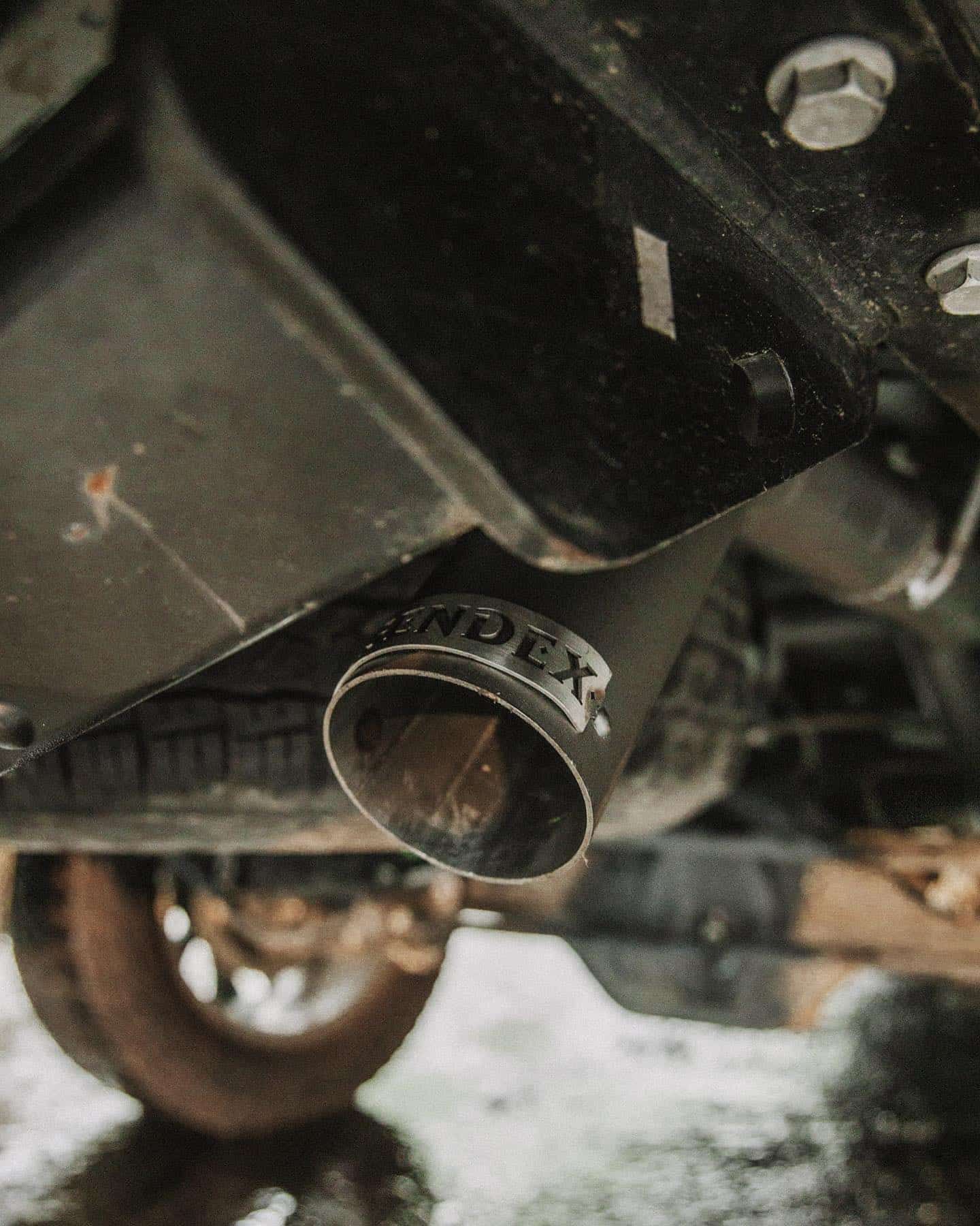 A Close Up of a Exhaust Pipe on the Underside of a Car — Nationwide Auto Service Centre in West Gosford, NSW