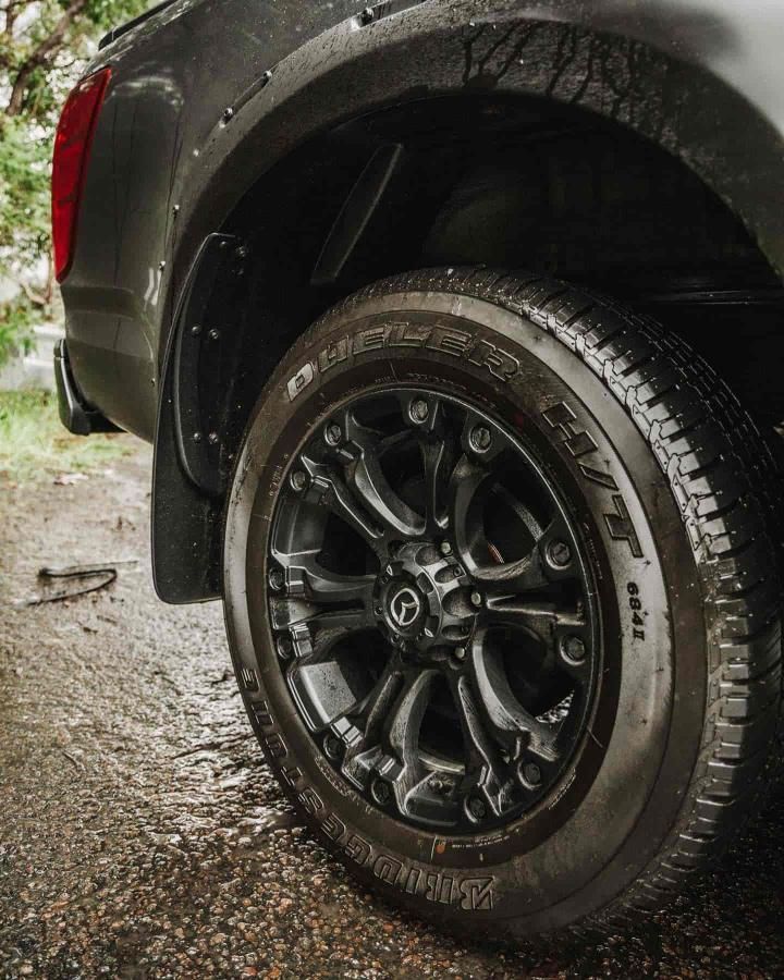 A Close Up of a Truck's Tire on a Gravel Road — Nationwide Auto Service Centre in West Gosford, NSW