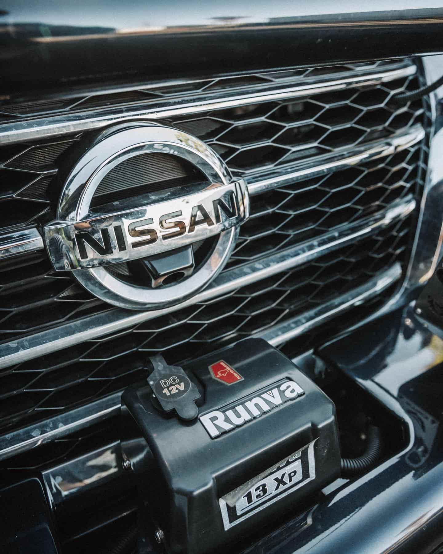 A Close Up of a Nissan Grille With a Winch Attached to It — Nationwide Auto Service Centre in West Gosford, NSW