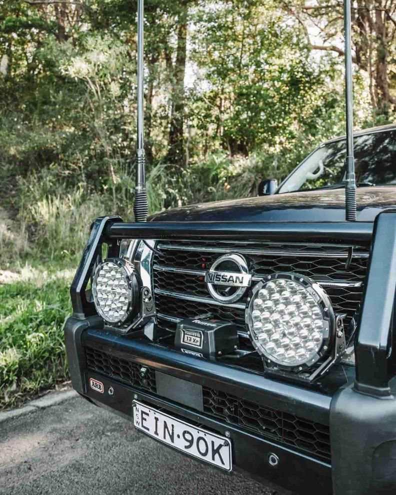 A Black Nissan Truck is Parked on the Side of the Road — Nationwide Auto Service Centre in West Gosford, NSW