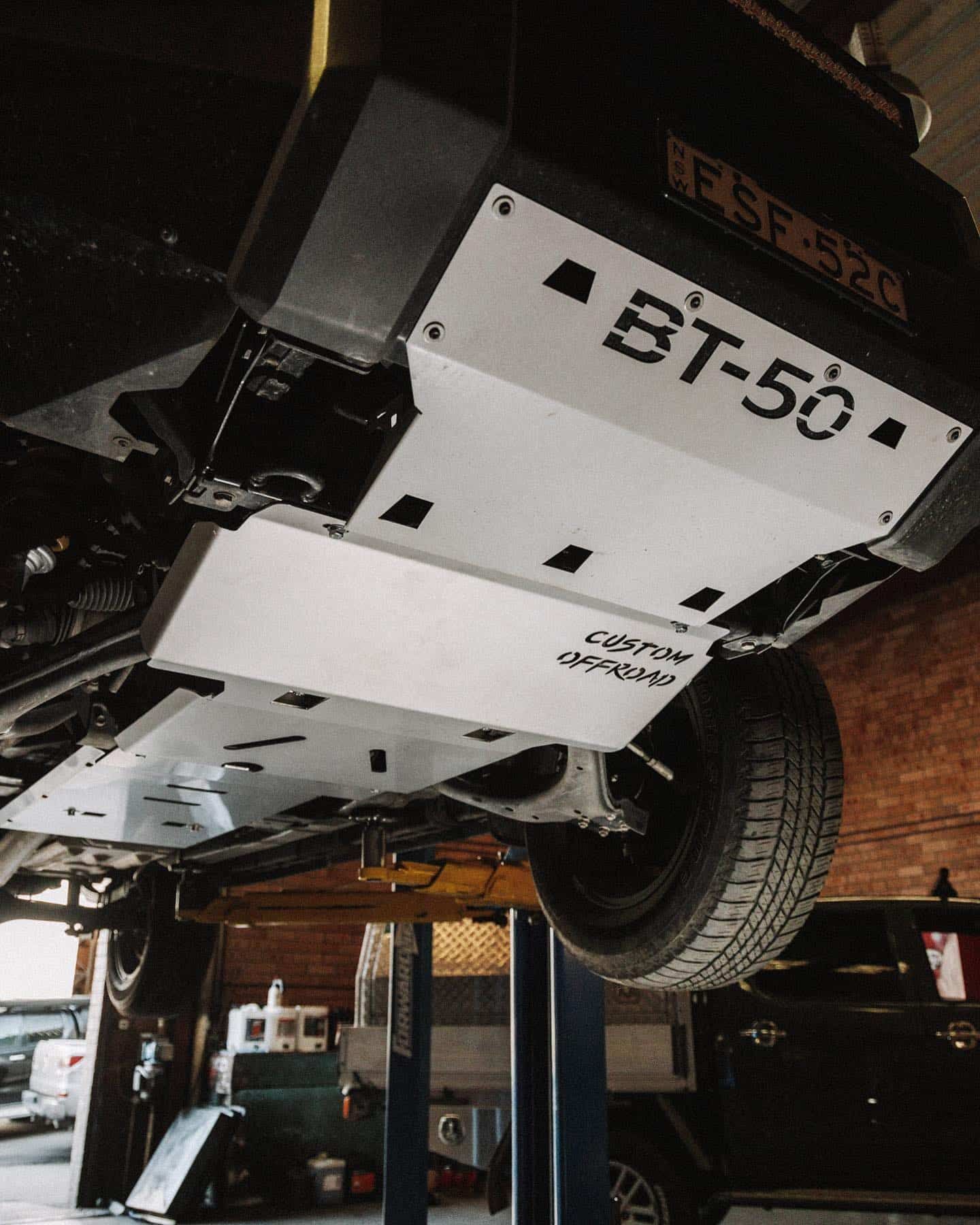 A Bash Plate is on the Underside of a Car — Nationwide Auto Service Centre in West Gosford, NSW