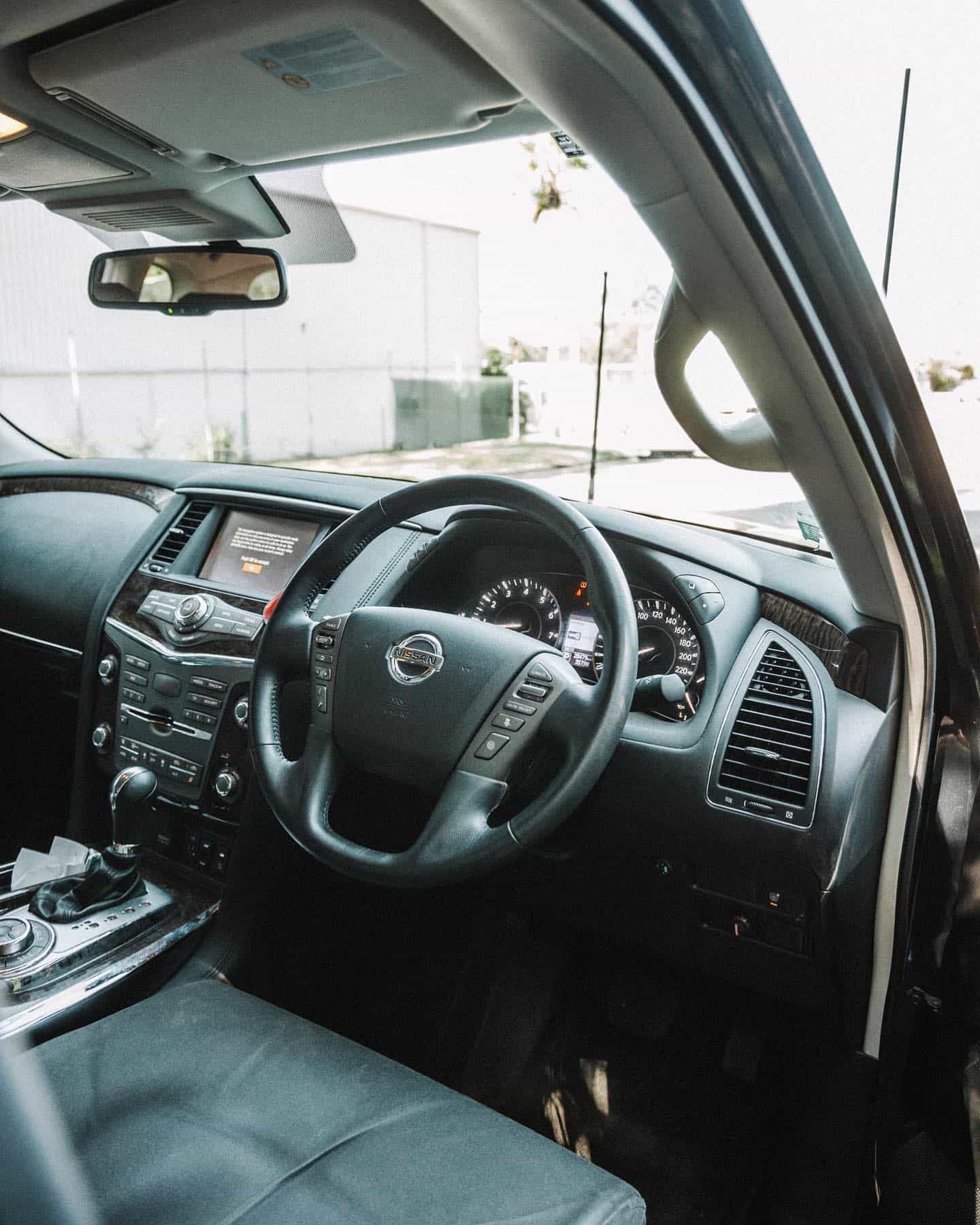 The Inside of a Nissan Car With the Door Open — Nationwide Auto Service Centre in West Gosford, NSW