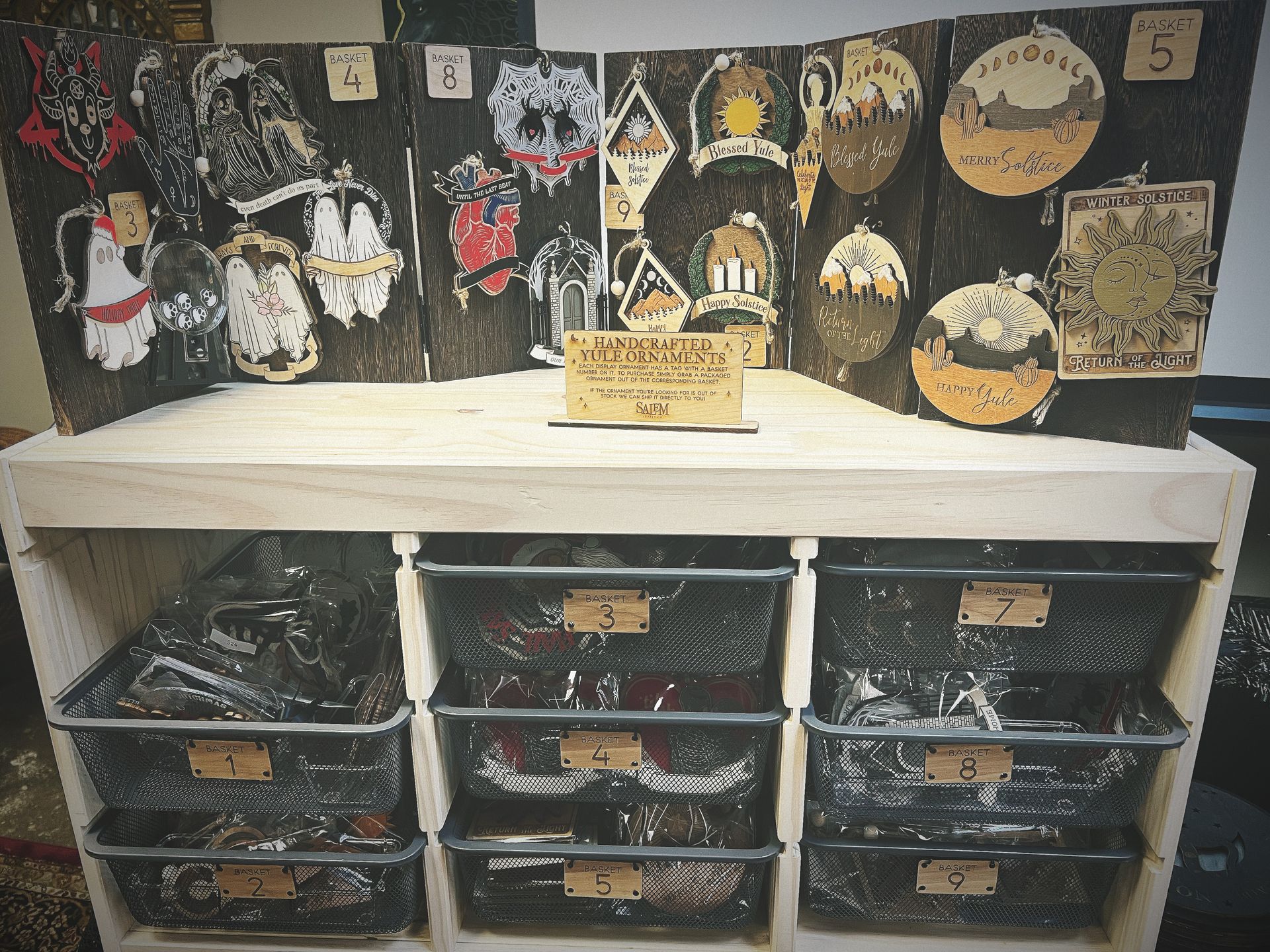 A wooden shelf with a bunch of boxes on it