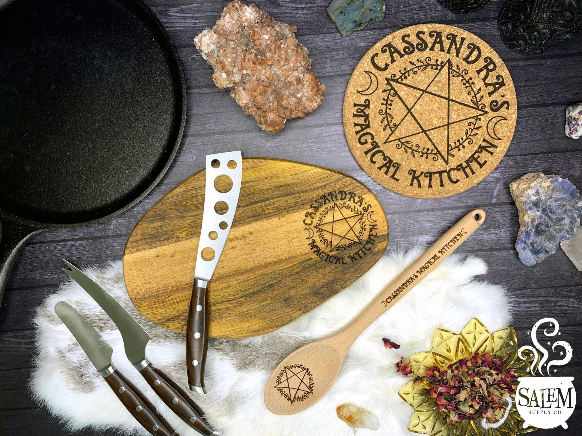 A wooden cutting board with a pentagram on it is sitting on top of a wooden table.