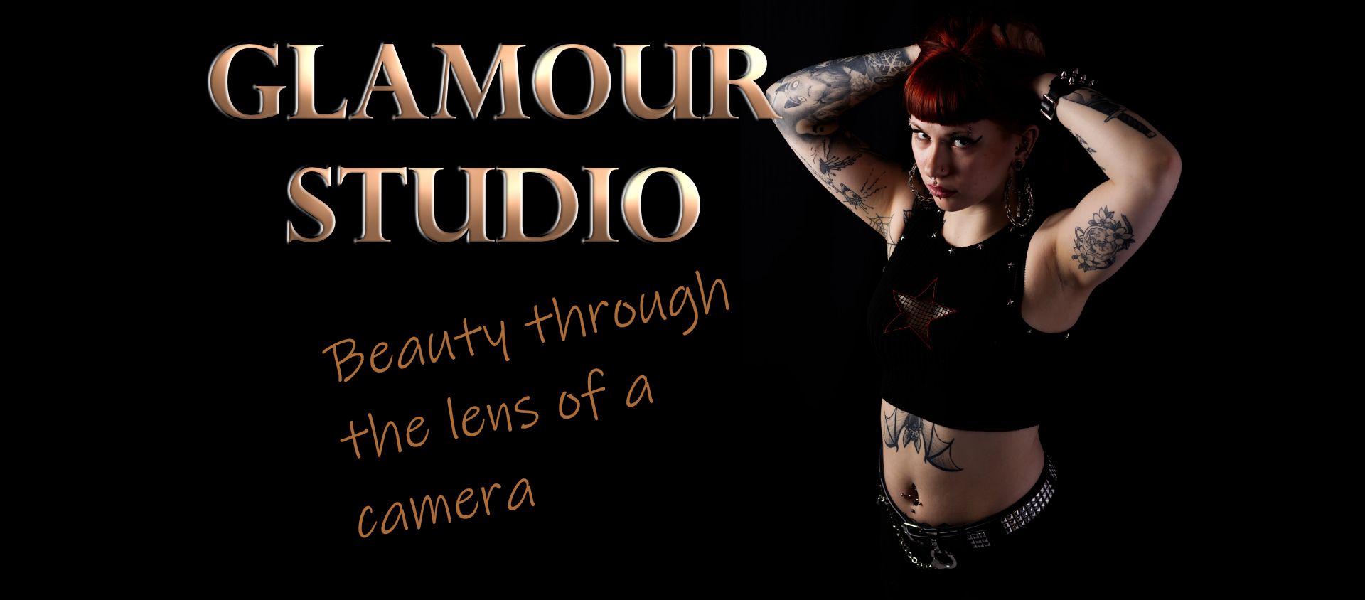 Photo studio Tattooed lady in gothic fashion wear.