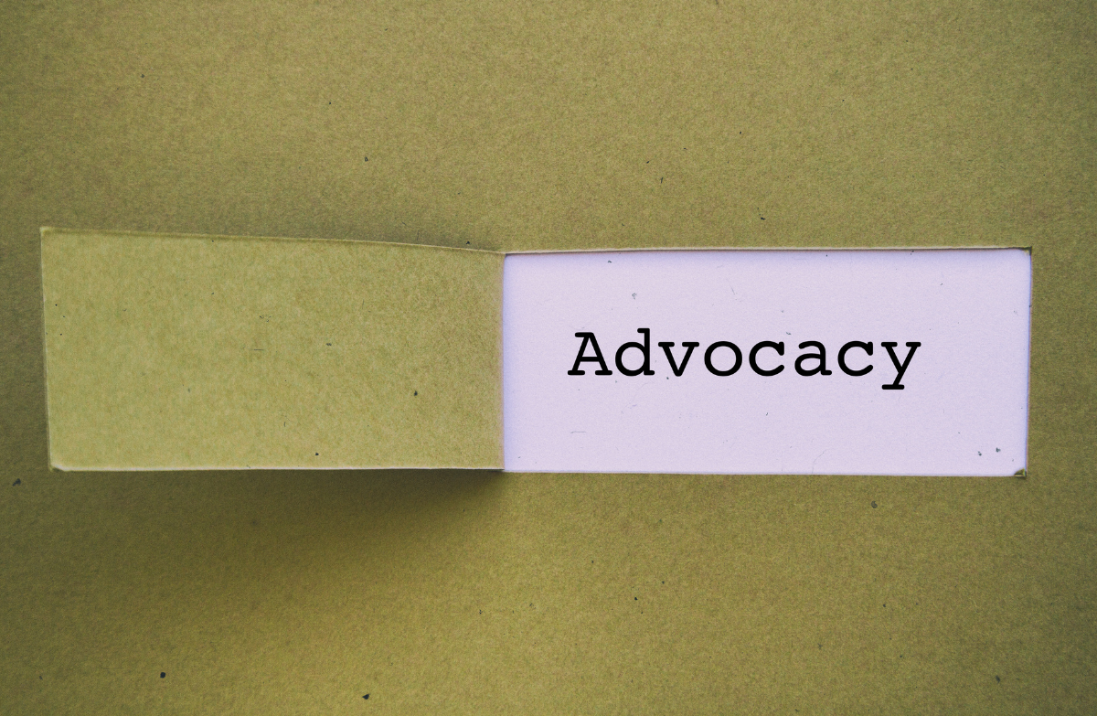 a piece of paper with the word advocacy written on it
