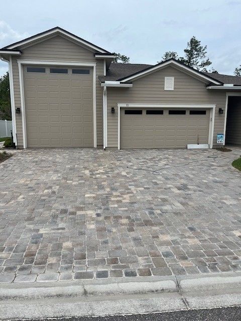 Before Pressure Wash the Front of Garage - Palm Coast, FL - Stressless Pressure Washing and Paver Sealing