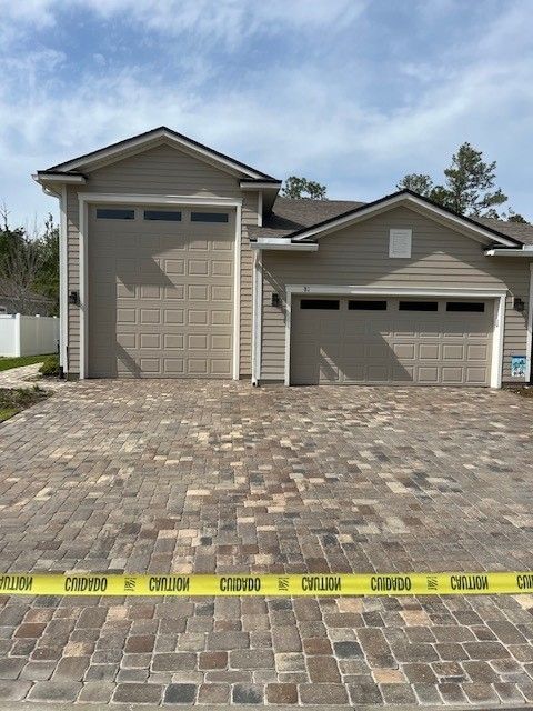 After Pressure Wash the Front of Garage - Palm Coast, FL - Stressless Pressure Washing and Paver Sealing