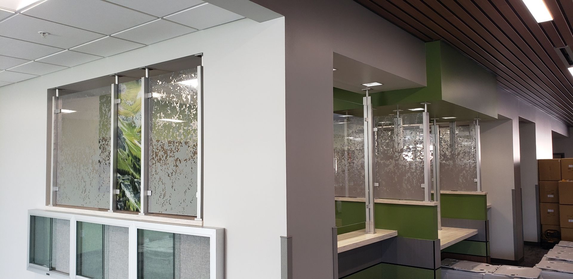 A room with a lot of windows and a ceiling