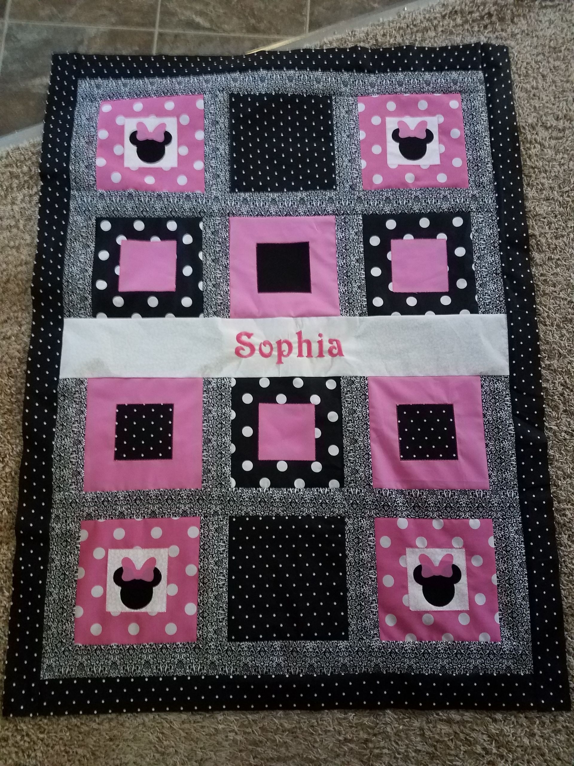 A quilt with the name sophia on it