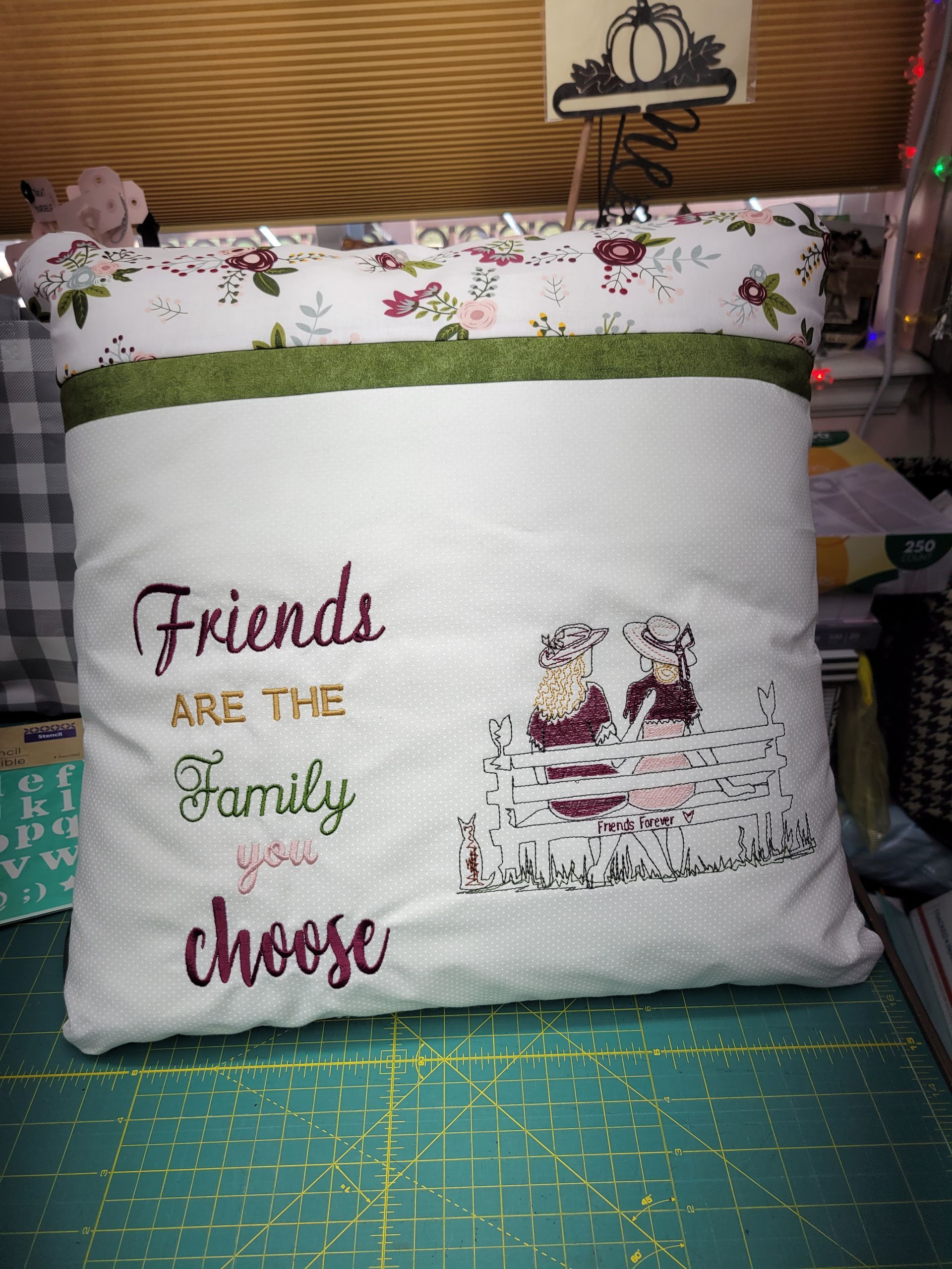 A pillow that says friends are the family you choose