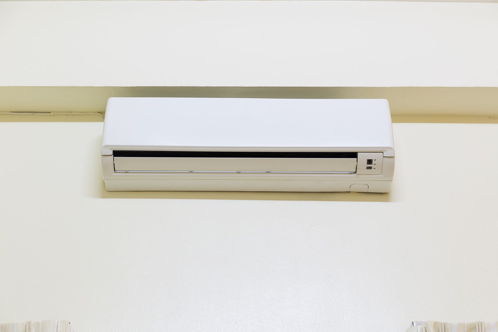 White wall-mounted air conditioner.