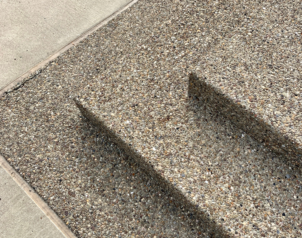 Exposed aggregate sidewalk enhancing Dublin, CA landscapes.