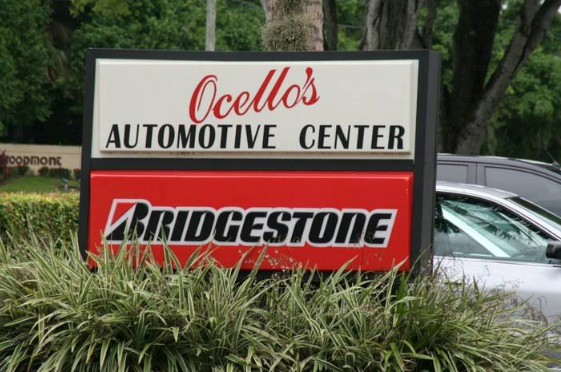 A white and red sign for 