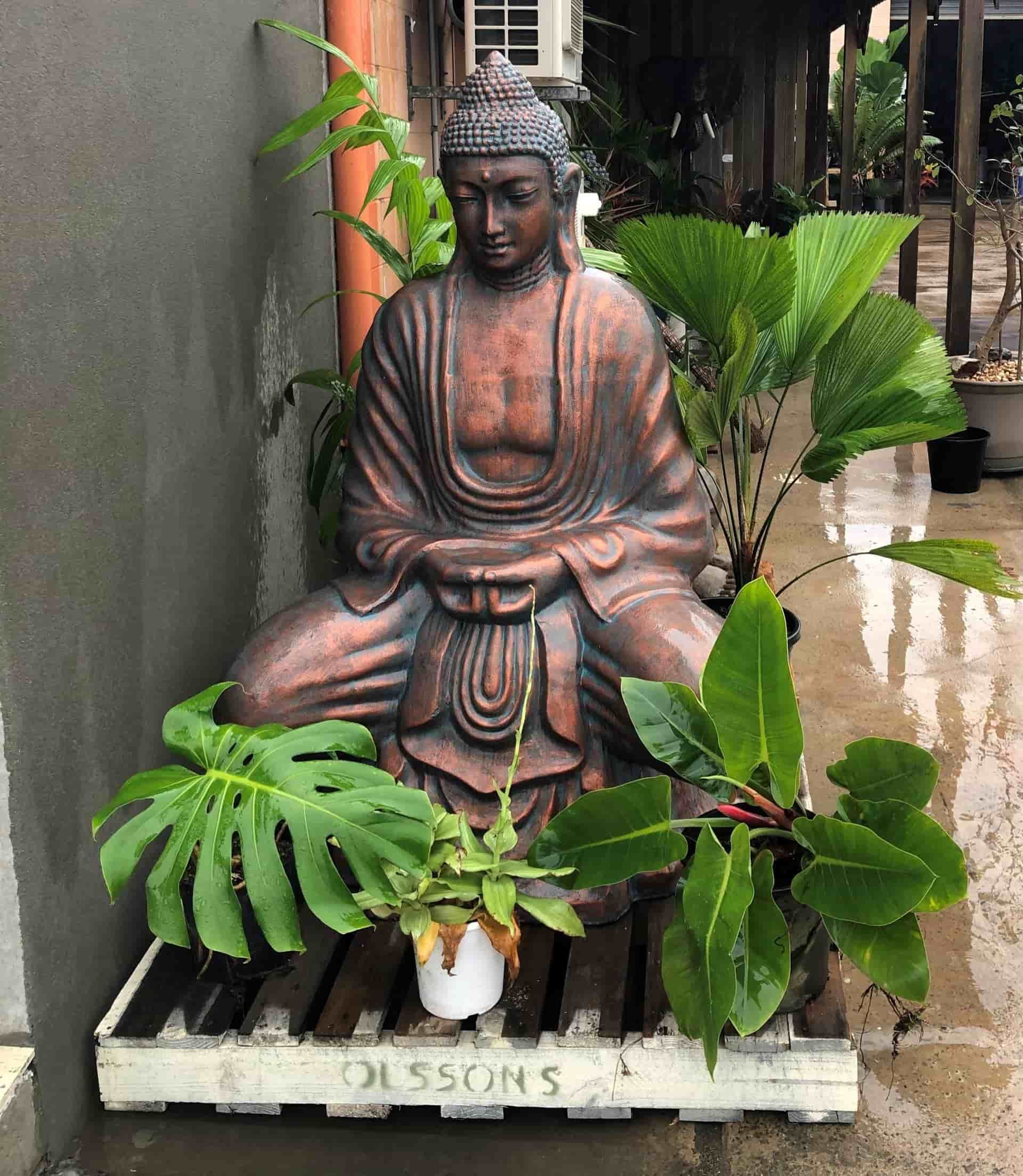 Copper sitting buddha
