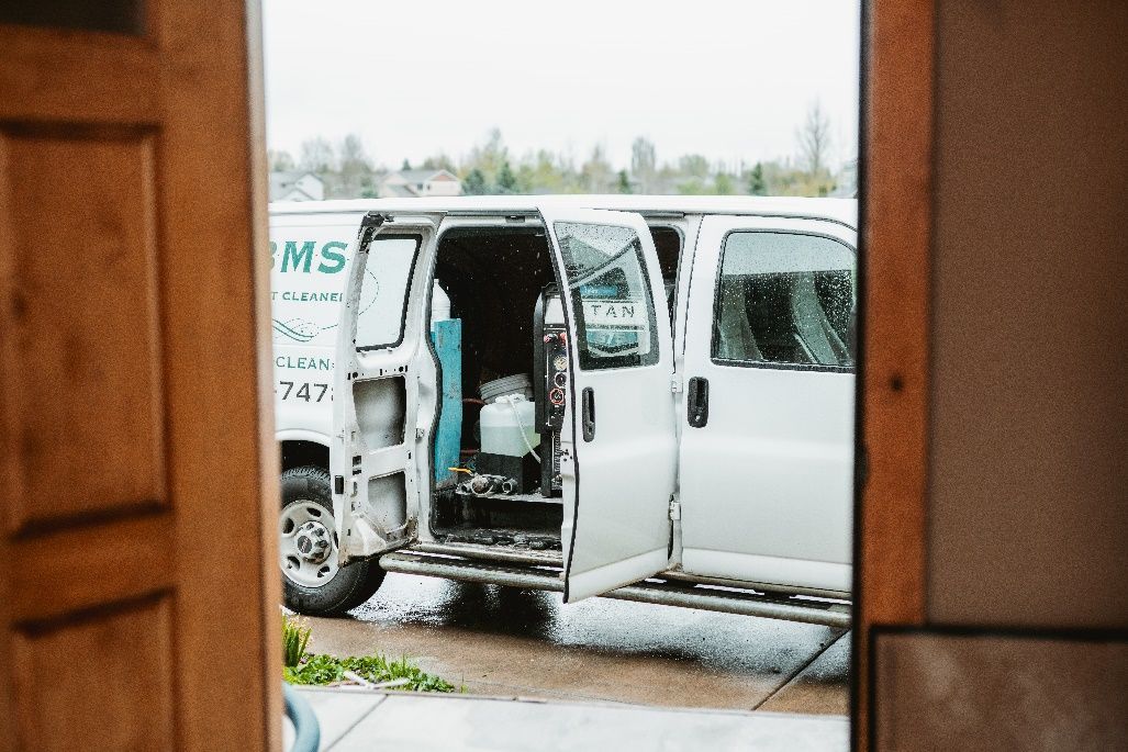 The picture shows an open BMS van