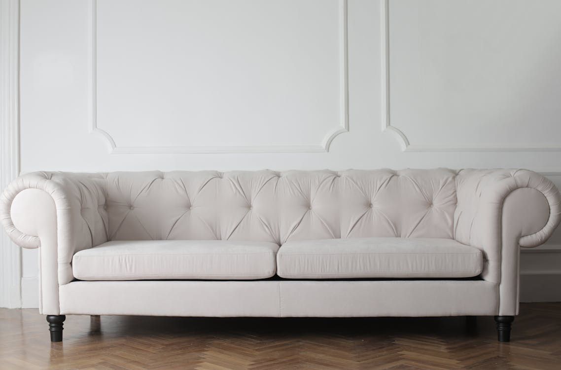 Professional upholstery cleaning service in Bozeman, MT, restoring a white couch